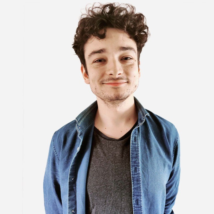 A photo of Kurt Wood, a technical SEO consultant, looking a bit smug.